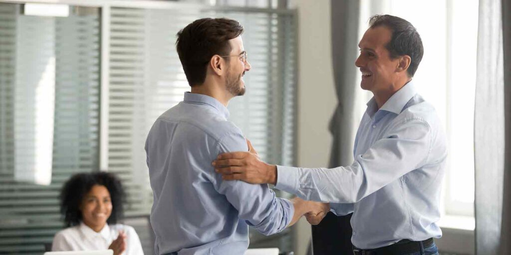 shaking hands on a Employee Benefits Strategies