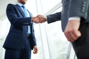Handshake taking place for a Insurance Services