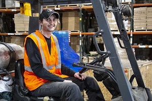 a forklift worker in a manufacturing company
