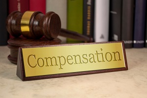 compensation plate with court gavel for benefit plans