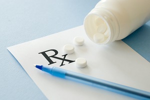 prescription with pen and tablets for  Insurance Premiums