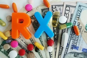 rx with tablets on dollar