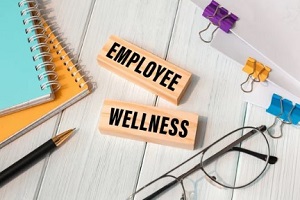 employee wellness in wooden blocks with specs and notes