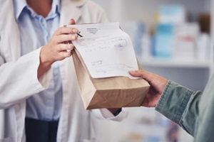 hands and prescription medicine for customer with paper bag for healthcare