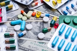 medicine pills or capsules money banknotes